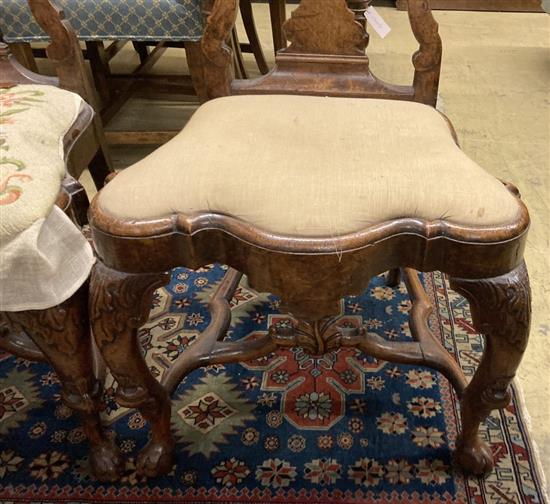 A pair of early 18th century Dutch carved walnut side chairs